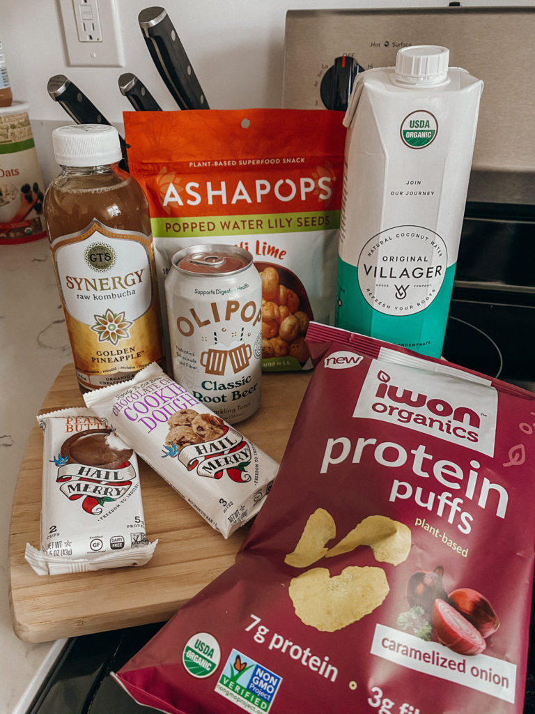 grocery haul with healthy snacks like kombucha chips dessert and coconut water