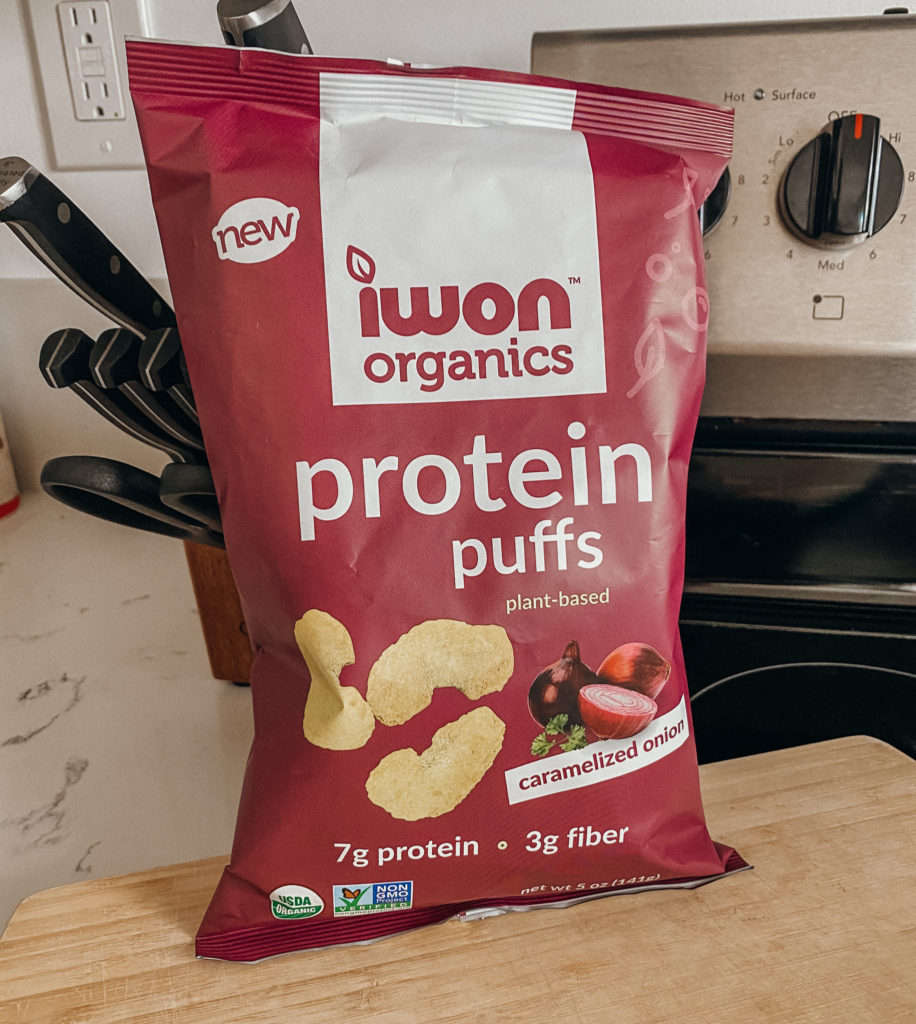 iwon organics protein puffs caramelized onion healthy snack from erewhon sitting on a kitchen countertop